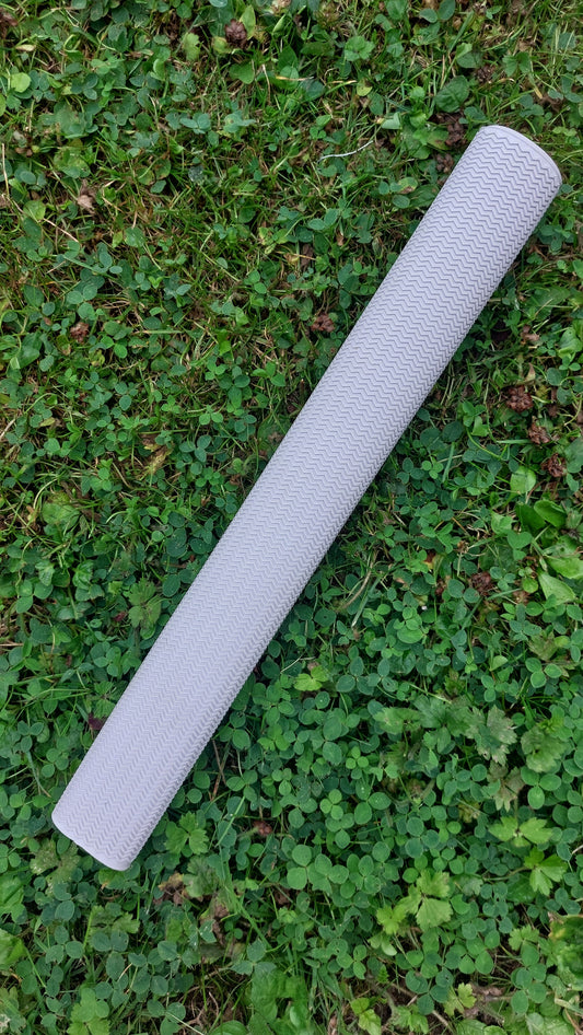 WC Cricket chevron cricket bat grip white rolled on grass for cricket bat restoration use