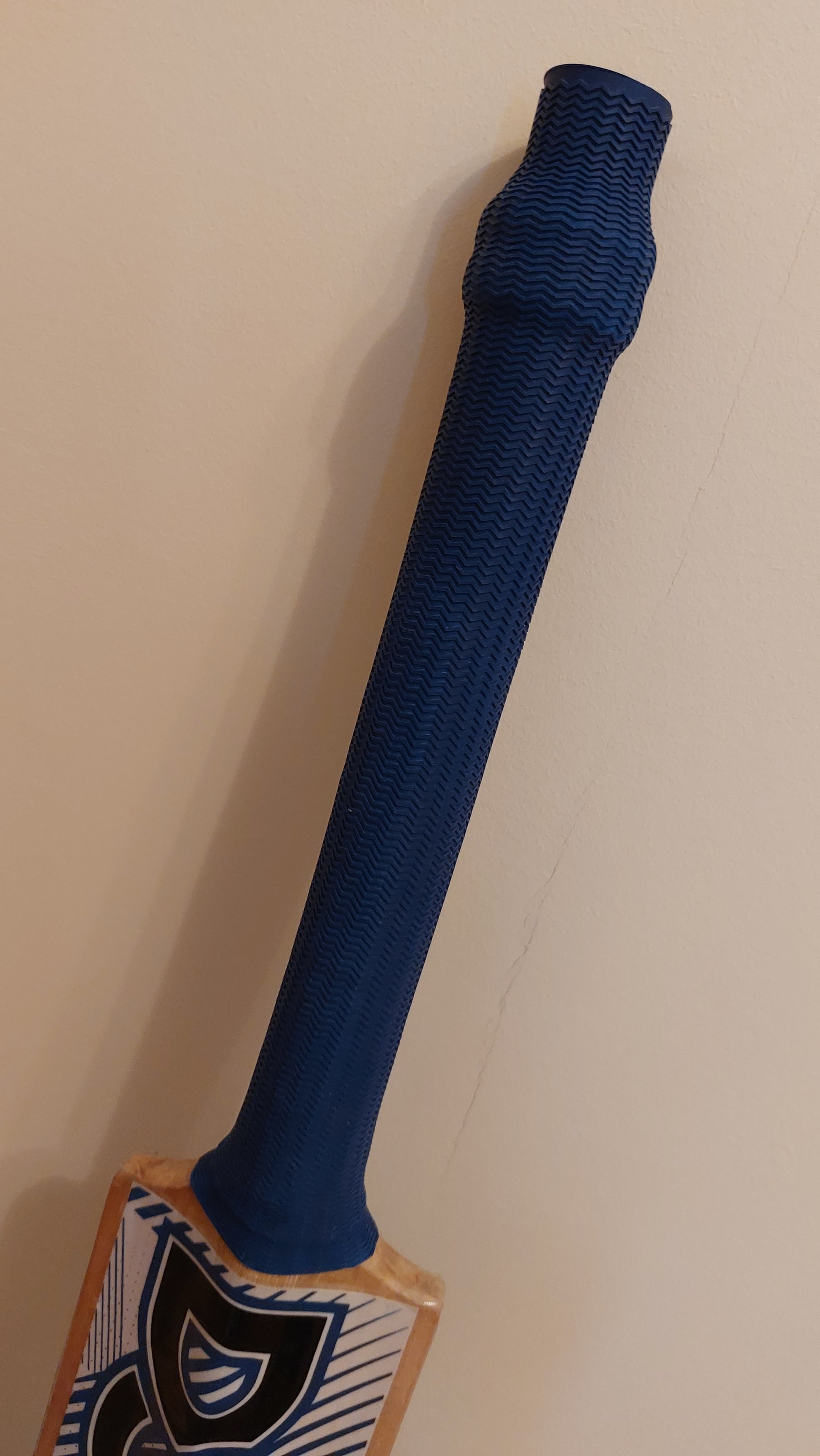 WC Cricket cricket bat grip replacement in navy blue on restored willow bat for better control